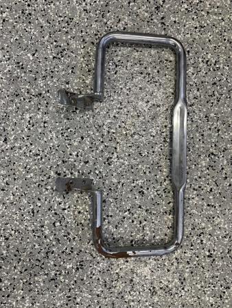 This is an image of a vespa p200e luggage carrier rack, front mudguard bumper bar & rear grab bar rail