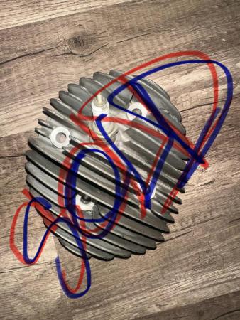 This is a visual of a vespa p200 head sold