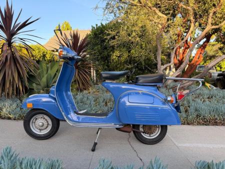 This is a visual of a 1974 vespa super 💥 one owner ⚡️ original paint