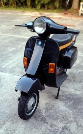 This is a photograph of a 1993 piaggio vintage vespa hp4