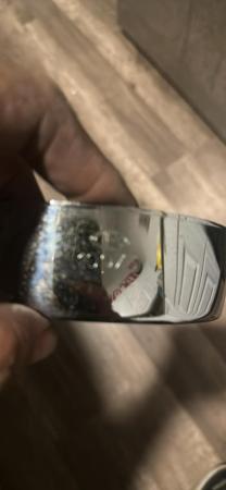 This is an image of a vespa headlight rim rally