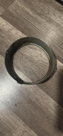 This is a photograph of a vespa headlight rim rally