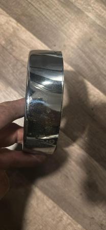 This is a capture of a vespa headlight rim rally