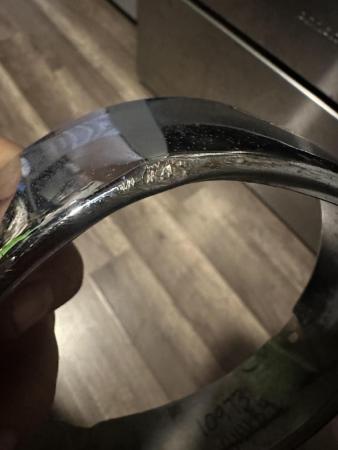 This is an image of a vespa cev headlight rim 