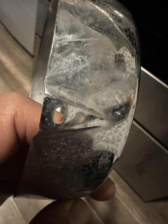 This is a still of a vespa cev headlight rim 
